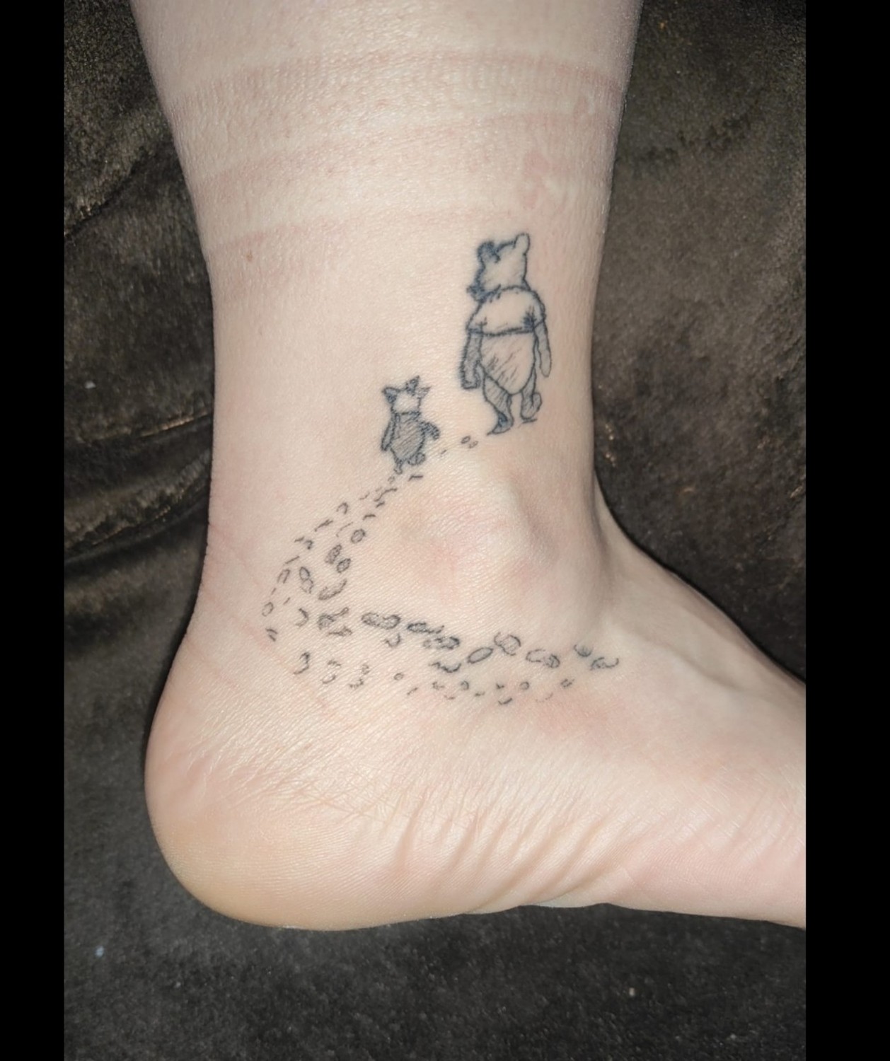 Kleines Tattoo am Knöchel